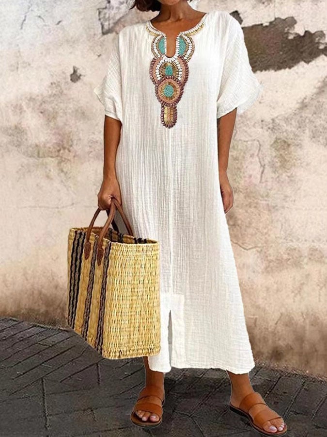 Women's airy kaftan dress in light blue, flowing silhouette, perfect for summer elegance and comfort, versatile styling.