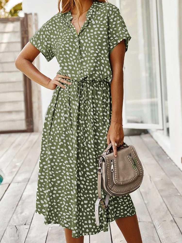 Women's breathable black midi dress, button front, relaxed fit with short sleeves, perfect for summer comfort and style.