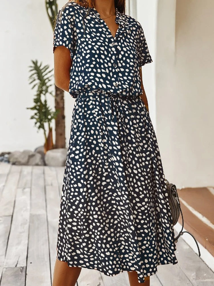 Women's breathable black midi dress, button front, relaxed fit with short sleeves, perfect for summer comfort and style.
