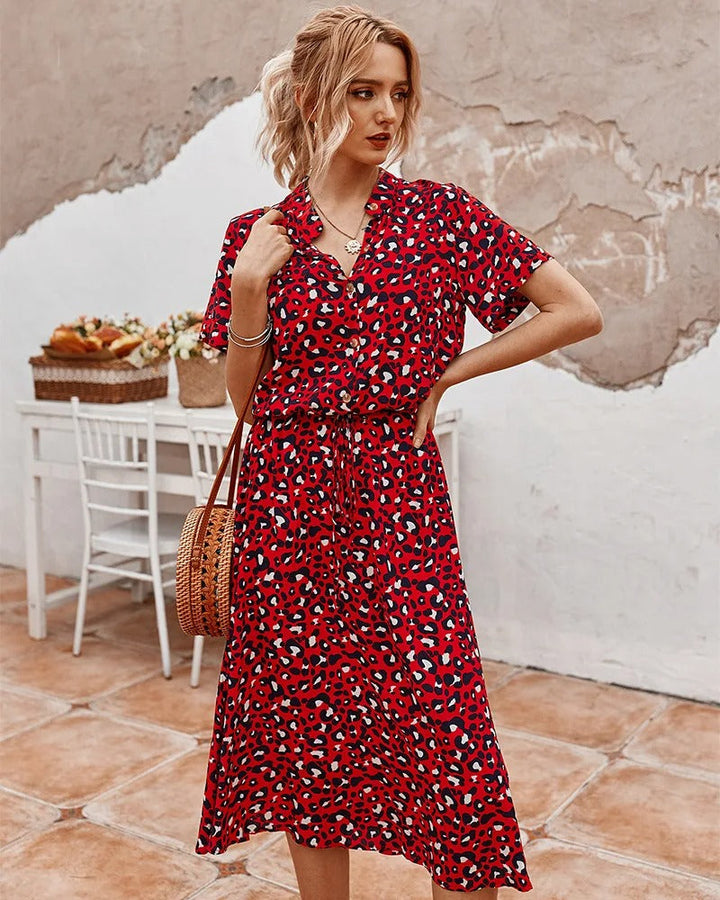 Women's breathable black midi dress, button front, relaxed fit with short sleeves, perfect for summer comfort and style.