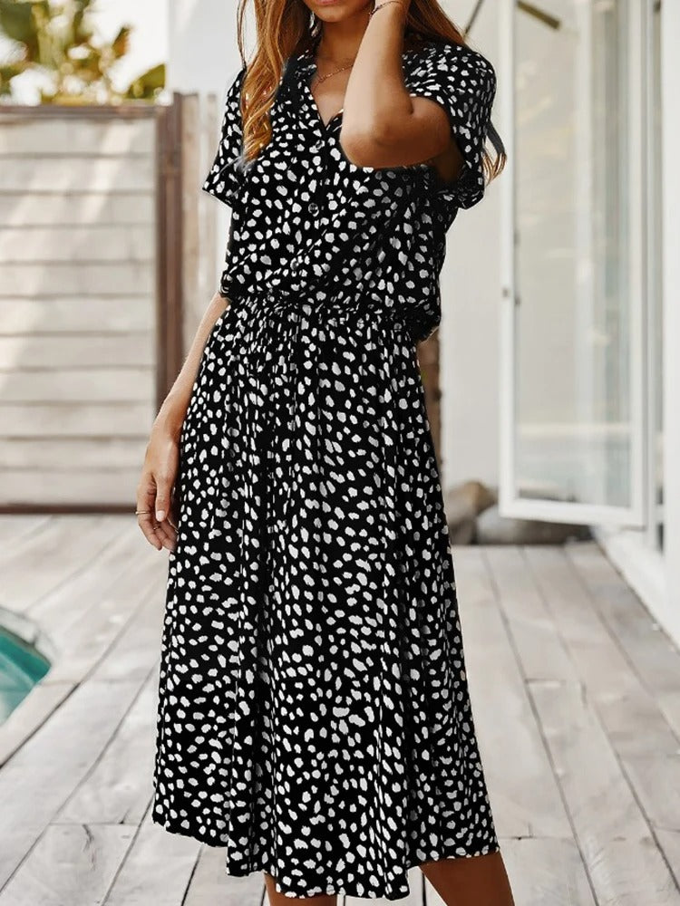 Women's breathable black midi dress, button front, relaxed fit with short sleeves, perfect for summer comfort and style.