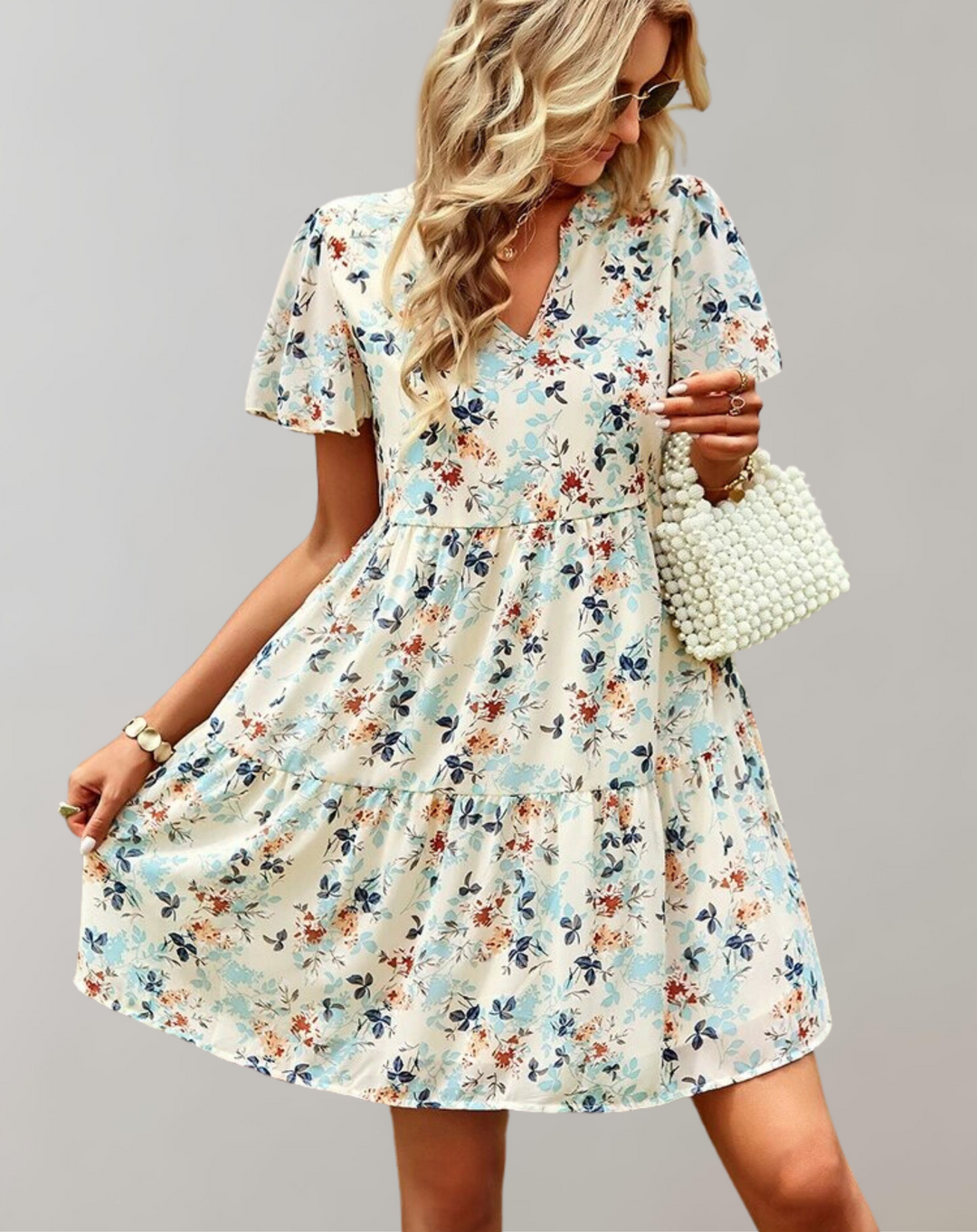 Women's casual V-neck floral midi dress, vibrant spring/summer print, loose fit, versatile style, sleeveless option