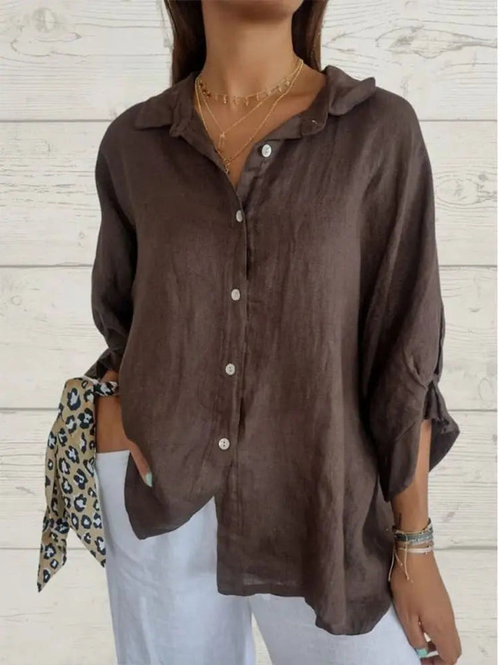 Women's chic linen blouse with relaxed fit, lightweight fabric, and elegant style, perfect for warm weather comfort.