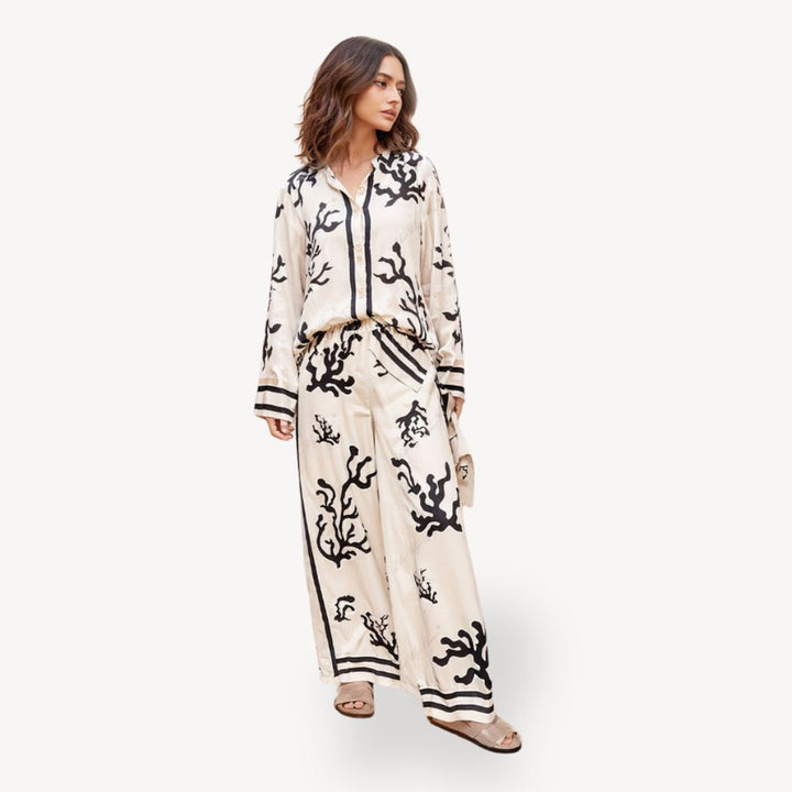 "Womens coral print pajama set, off-white with black coral patterns, long-sleeve top, elegant and stylish sleepwear."