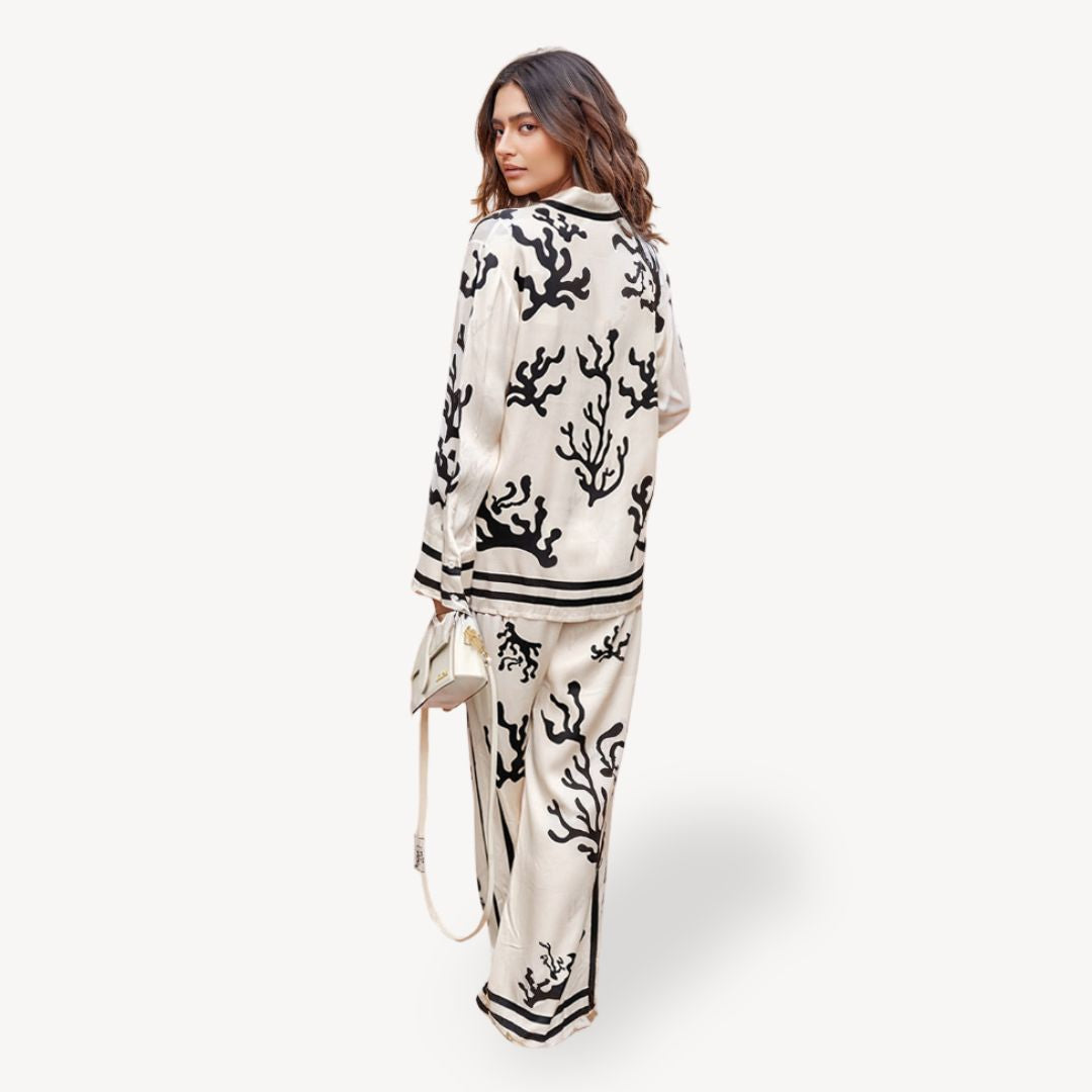 "Womens coral print pajama set, off-white with black coral patterns, long-sleeve top, elegant and stylish sleepwear."
