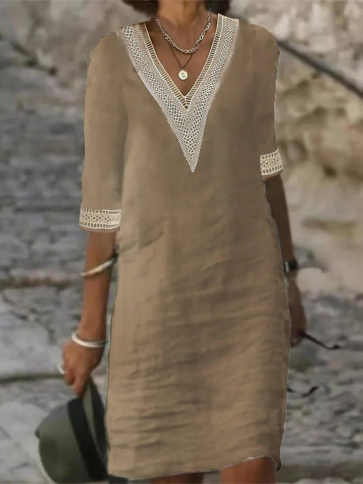 Women's cotton-linen casual V-neck dress, lightweight fabric, breathable for warm weather, relaxed fit, versatile style.