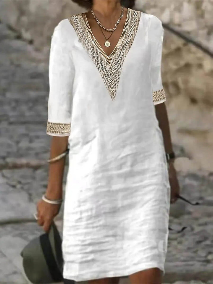 Women's cotton-linen casual V-neck dress, lightweight fabric, breathable for warm weather, relaxed fit, versatile style.
