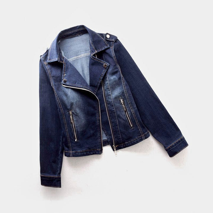 Lifestyle shot of a woman wearing a light blue denim jacket.