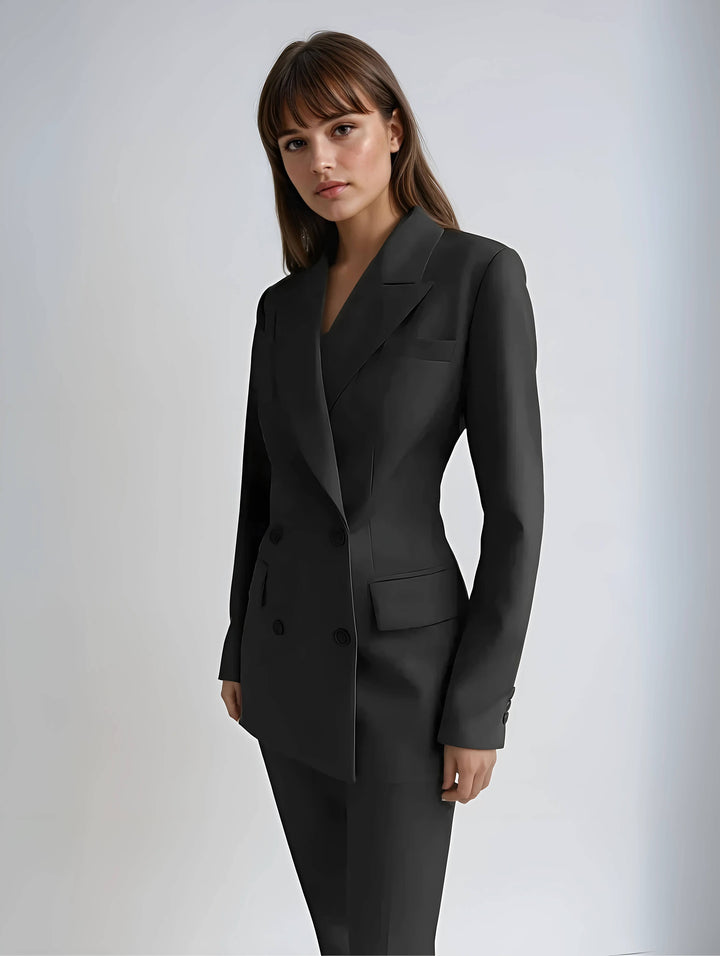"Womens elegant blazer and trousers set in tailored fit, showcasing sleek silhouette and high-quality fabric for chic style."