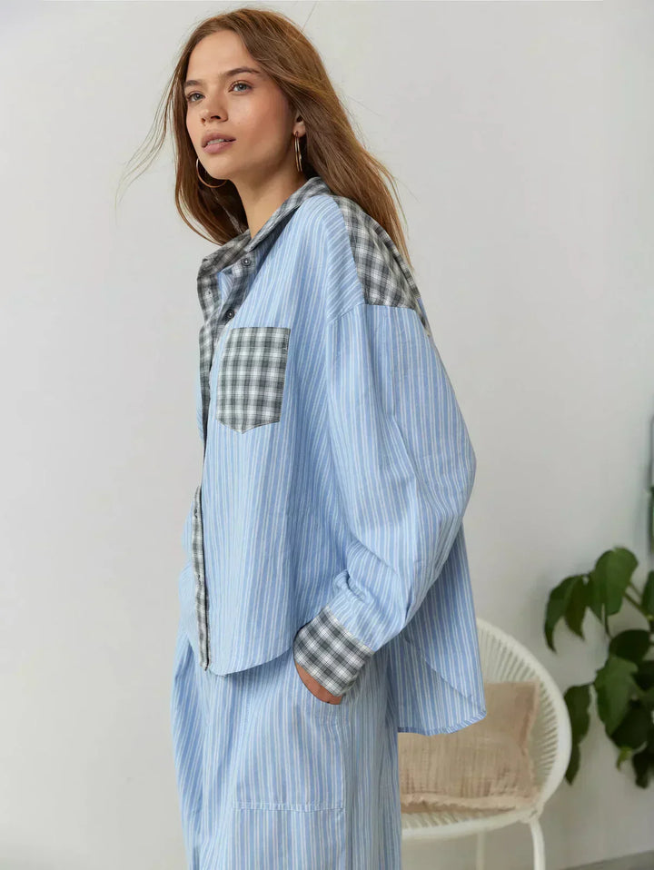 "Women's pink pajama set with elegant details, luxurious softness, and a relaxed fit, perfect for sleep and lounge."