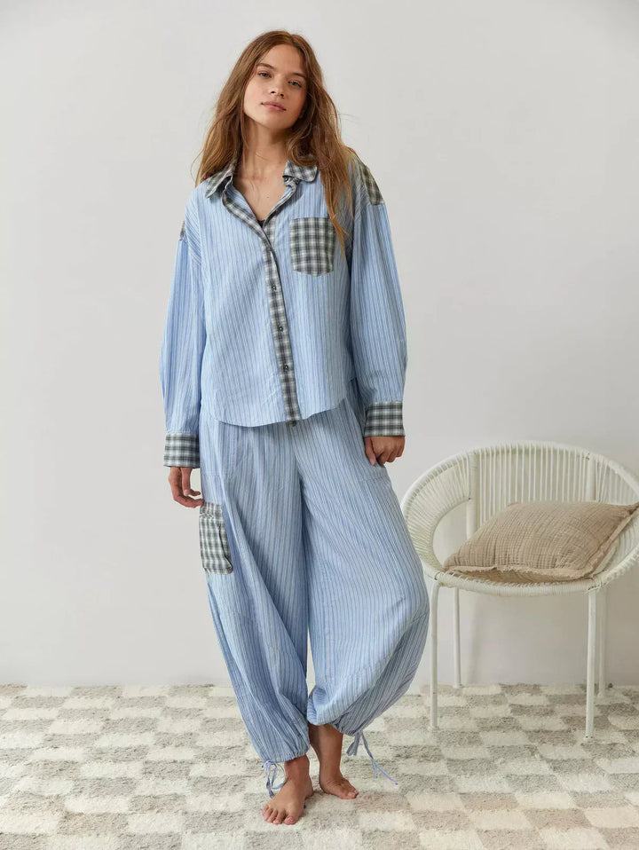 "Women's pink pajama set with elegant details, luxurious softness, and a relaxed fit, perfect for sleep and lounge."